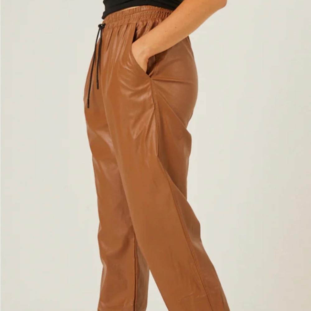 FAUX LEATHER JOGGERS pant never use have a little peel a small tiny, one